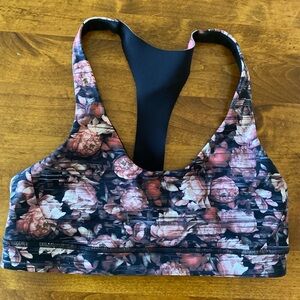 Lululemon Peony Sports bra. Floral print.Size 10, black and pinks.